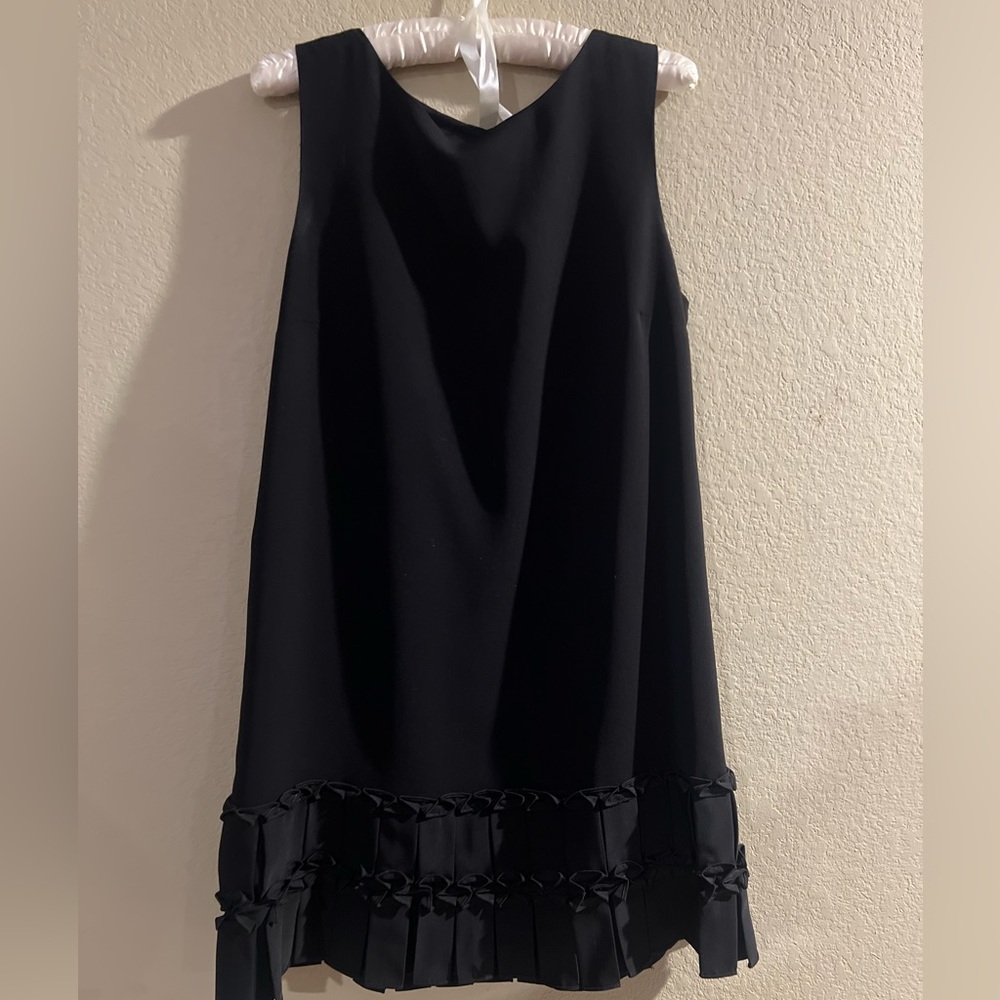 Sophisticated Black Sleeveless Dress with Ruffled Hem